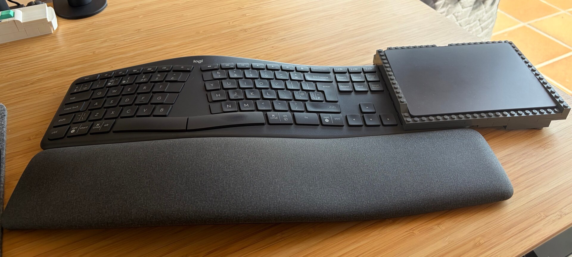 Logitech ERGO K860 keyboard review with a custom-made LEGO stand for Apple Trackpad 2025