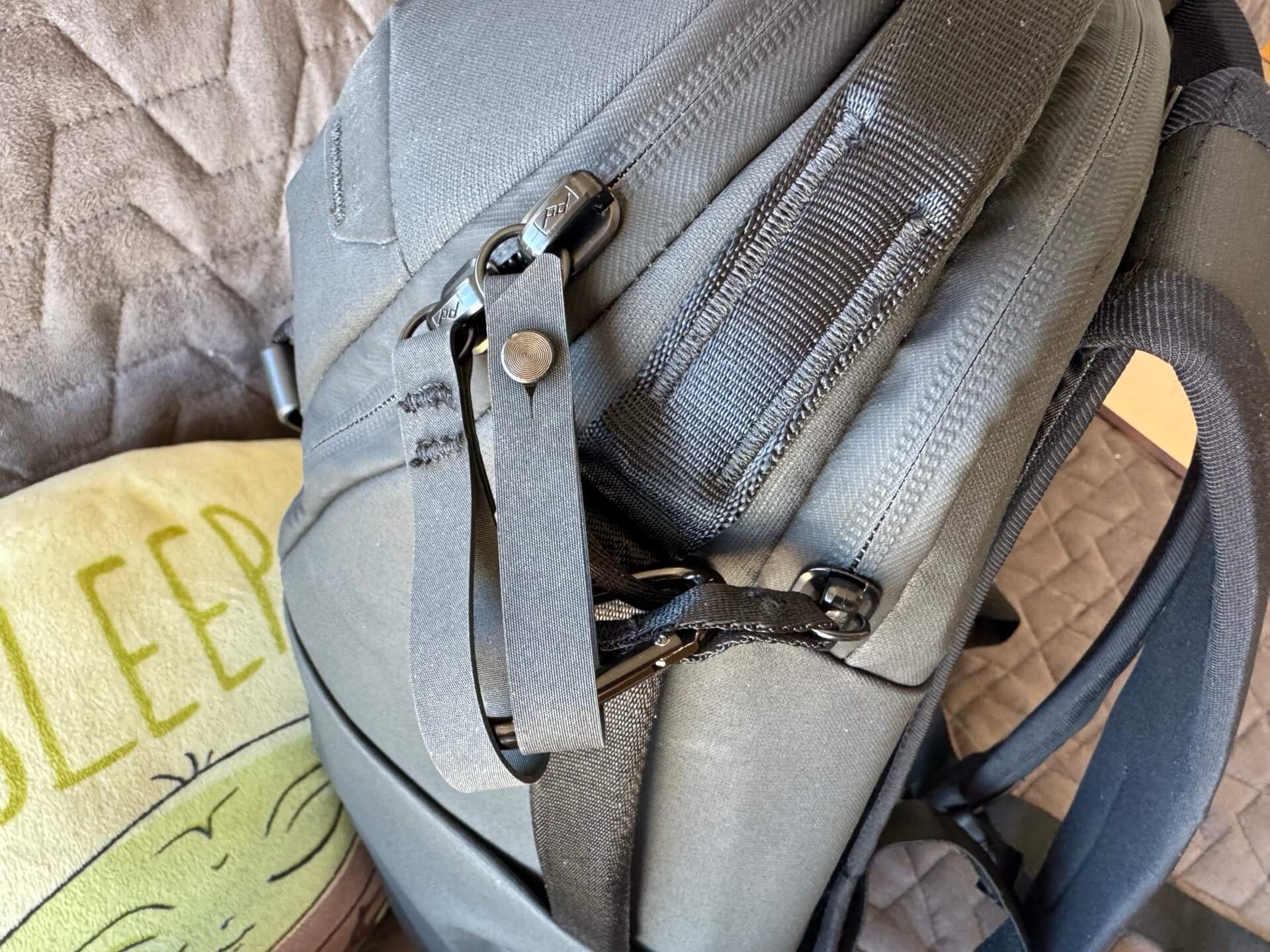 Is Peak Design Everyday Zip 15L an ideal small backpack for airplanes? carabiner